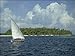 Photo Jigsaw 16x12 (40x30cm) Sailing boat off a tropical island in the Maldive Islands by Robert Harding