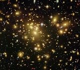 Astronomers Find One of the Youngest and Brightest Galaxies in the Early Universe