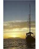Photographic Print of Charter yacht at anchor against sun setting over Wolf Volcano. (Schooner... from Specialist Stock