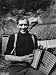 Accordion Played by Tristan Da Cunha Islander Photographic Poster Print by Carl Mydans, 12x16