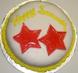 Carrot Decorated Cake Single Layer 8 RoundTopped with Cherry Star Gummies