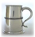 Pewter tankard with single decorative Celtic pattern