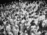 Clerks Signaling Whether to Buy or Sell From Floor of Bombay Stock Exchange Photographic Poster Print by Margaret Bourke-White, 40x30