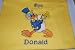 Embroidered Yellow T with Donald Duck Making Music Adult-M