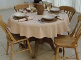 from THE TABLECLOTH COMPANY 55 DIAMETER BEIGE ROUND TABLECLOTH (4 SEATER)