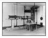Historic Print (L): [U.S. Bureau of Chemistry activities, 190-: J.B. Howard in lab, using microscope; microp