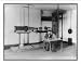 Historic Print (L): [U.S. Bureau of Chemistry activities, 190-: J.B. Howard in lab, using microscope