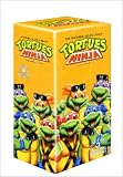 Revue Warner Vision France  / Coffret Tortues Ninja 3 VHS - Vol.1 : Donatello recycle / Polly veut une pizza / Le Triomphe de Schredder / Cyber tortues / Echec à l'enfer / L'Enfer est dans la rue