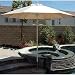 9' Tropishade Commercial Umbrella Constructed with 8 Fiber Glass Ribs and Sunbrella Fabric (631W59)