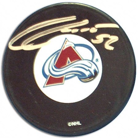 Buy Adam Foote Autographed Colorado Avalanche Puck by Mounted Memories