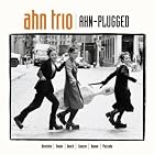 Click here to buy Ahn-Plugged by Ahn Trio, Henji Bunch, Michael Nyman, David Bowie, and Pat Metheny .
