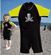 Size 00 (6-12 months) Yellow Childrens shortie wetsuit. 2mm neoprene with Pirate motif