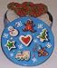Scott's Cakes 1 lb. Milk Chocolate Covered Pretzel with Christmas Jimmies in a Christmas Cookie Tin