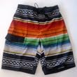 Mens Swim Trunks/Board Shorts. Black/Multi or White Multi. Elastic waist, board short front, velcro fly and side flap pocket. Fully lined. Sizes S-XL.