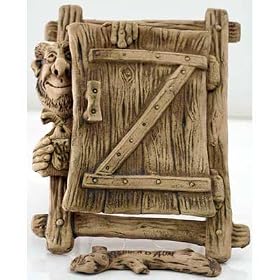 CERAMIC AMULET/Door to Wealth at Home [Made in Russia. Size: 7 x 5.5 inches (17 x 13.5 cm). Material: ceramic (clay). Hand-crafted] [A small gnome peeks around the door, carrying a bag of money. This marvelous sculpture can be hung and add a touch of whimsy to any room in your house. Amulets, or talismans, possess a magical ability to defend their owners or improve various areas of their lives. They can protect against sickness, bad luck, and danger; they can also bring success, luck, love, money, and more. This gnome - hand-sculpted from natural clay - will tirelessly defend you and your loved ones from any sort of misfortune!]