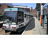 Photographic Prints of Metrolink tram at tram stop, Manchester, England, United Kingdom, Europe from Robert Harding