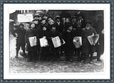 Historic Print (L): 4 p.m. Group of newsies selling in front of South Station. 4 of them said they were 11 y