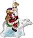 Santa on a Polar Bear Glass Ornament
