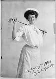 Golf girl,young woman holding a golf club behind her shoulders,c1906,women,sport