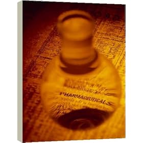 16 Inch Box Canvas (40cm) Pharmaceutical flask on a newspaper finance page by Science Photo Library