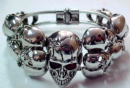 Click here to buy Huge Evil Skulls Chrome Bangle Bracelet Goth Punk by Coolstuff4u.