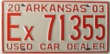 Arkansas Used Car Dealer License Plate with Red Numbers