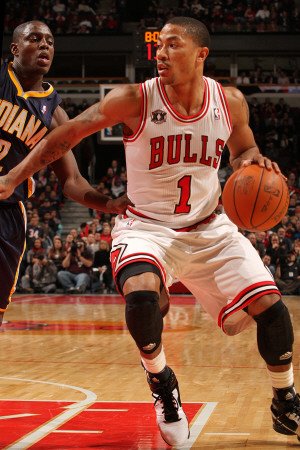 Indiana Pacers v Chicago Bulls: Derrick Rose and Darren Collison Photographic Poster Print by Ray Amati, 8x12