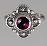 An Elegant Sterling Silver Gothic Ring Featuring a Lovely Garnet Gemstone