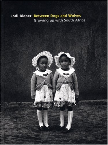 City Travel Guides Discounted  Books : Between Dogs and Wolves: Growing up with South Africa