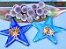 Arrangement of Star Anise on Glass Star Shaped Tiles, on Blue Table with Echinops Ritro Photographic Poster Print by Linda Burgess, 16x12
