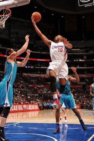 New Orleans Hornets v Los Angeles Clippers: Eric Gordon Photographic Poster Print by Andrew Bernstein, 16x24