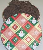 Scott's Cakes Mini Chocolate Covered Pretzels in a Snowman Tin