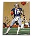 Autographed Roger Staubach 8X10 photo Wearing a Blue Jersey