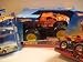 Hot Wheels Monster Jam Prowler 1/24 and Tropical Thunder 1/64 with the Exclusive Car: Vw Golf - 350z 2 Pack {4 Pieces}