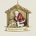 Kneeling Santa Claus with Baby Jesus Religious Christmas Ornament