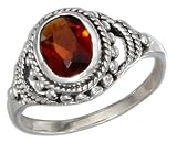 Sterling Silver Faceted Oval Bezel Set Garnet Ring.
