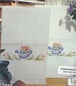 STAMPED TERRY KITCHEN TOWELS-FLORAL WATERING CAN