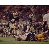NCAA Tony Rice Notre Dame Run Vs USC Autographed 8-by-10-Inch Photograph with "Luck Of The Irish" Inscription