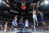 New York Knicks v Denver Nuggets: Gary Forbes and Danilo Gallinari Photographic Poster Print by Garrett Ellwood, 28x42