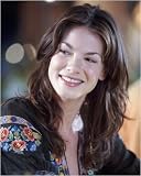 Michelle Monaghan by Unknown. CANVAS with 3/4 inch bars. 8.00 inches width by 10.00 inches height. Highest Quality Art Poster Print