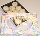 Scott's Cakes 1 lb. White Chocolate Cashew Pattie in a Daisy Box