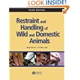 Restraint and Handling of Wild and Domestic Animals by  Murray E. Fowler