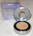 Urban Decay eye shadows are easily blendable, pigment-intense shimmer and color-rich sparkle shades. These super soft, silky textured shadows layer easily so you can go from sheer to intense. Want to be dramatic? Apply wet. Incredible staying power, can go all day and into the night. Dust on your face and shoulders for a unique shimmer...if you dare! The eye shadow comes in a 1-3/8" diameter silver case with snap close lid, styled like a subway token with clear plastic center so you know what shade you are reaching for. Rust is an amazing, now discontinued, unique copper/peach shimmer shade with flashes of gold and green dependent on what light you are in. Apply it wet to bring out the iridescence. (1.5g, .05 oz), boxed.
