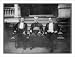 Historic Print (L): [Theodore Roosevelt, Rev. M.J. Hoben, and John Mitchell, posed, seated in front of porch