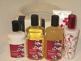 Bath & Body Works Japanese Cherry Blossom Gift Set in Red & White Basket Featuring 7 Full Size Products - Body Lotion, Shower Gel, Bubble Bath, Satin Body Veil, Limited Edition Radiant Powder Spray, Instant Radiance Gradual Tan Body Lotion and Limited Edition EDT Luxe Travel Spray - A $95 Value!