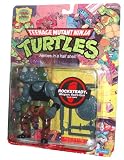 Teenage Mutant Ninja Turtles 25th Anniversary 5 Inch Tall Action Figure - Rocksteady with Retro Gun, Shield and SwordIMAGE
