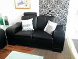 from LNH Designs Black 2 Seater settee in Faux Leather
