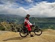 Mountain Biker at Waimea Canyon, Kauai, Hawaii - Evocative Photographic Print by Brendan Reals