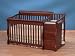 Ellis 4-in-1 Sleep System with Changing Station in Cherry Finish By Simplicity for Children