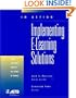 In Action : Implementing E-Learning Solutions (In Action Case Study Series)